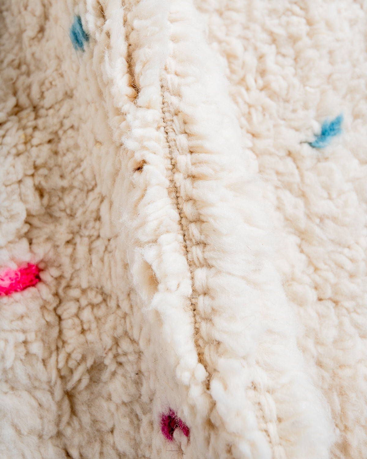 Modern, designer, handcrafted Berber rug from Morocco. Beniourain carpet with beautiful colours and patterns and fluffy wool texture.